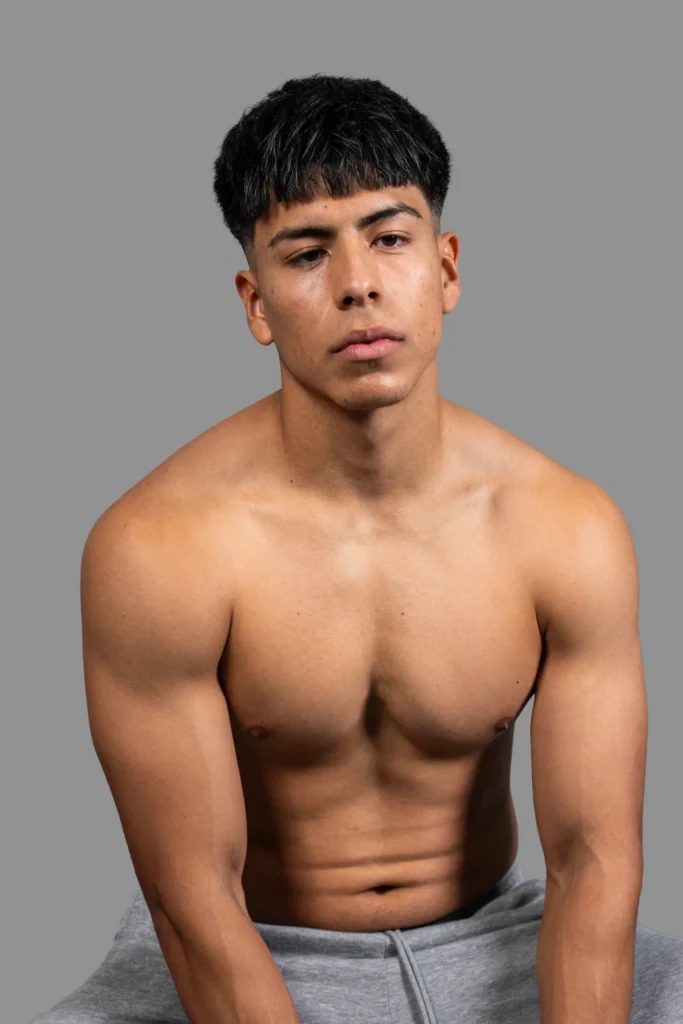Man's bare shoulders and chest, laser tattoo removal at Viva Vitality, Lakeland FL