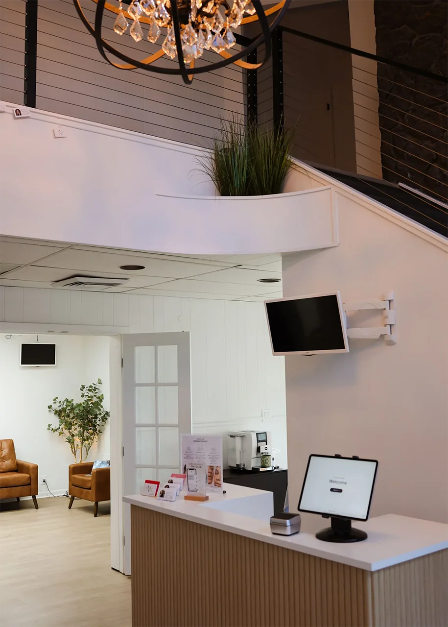 Front desk and lobby of the Viva Vitality MedSpa treatment studio in Lakeland, Florida
